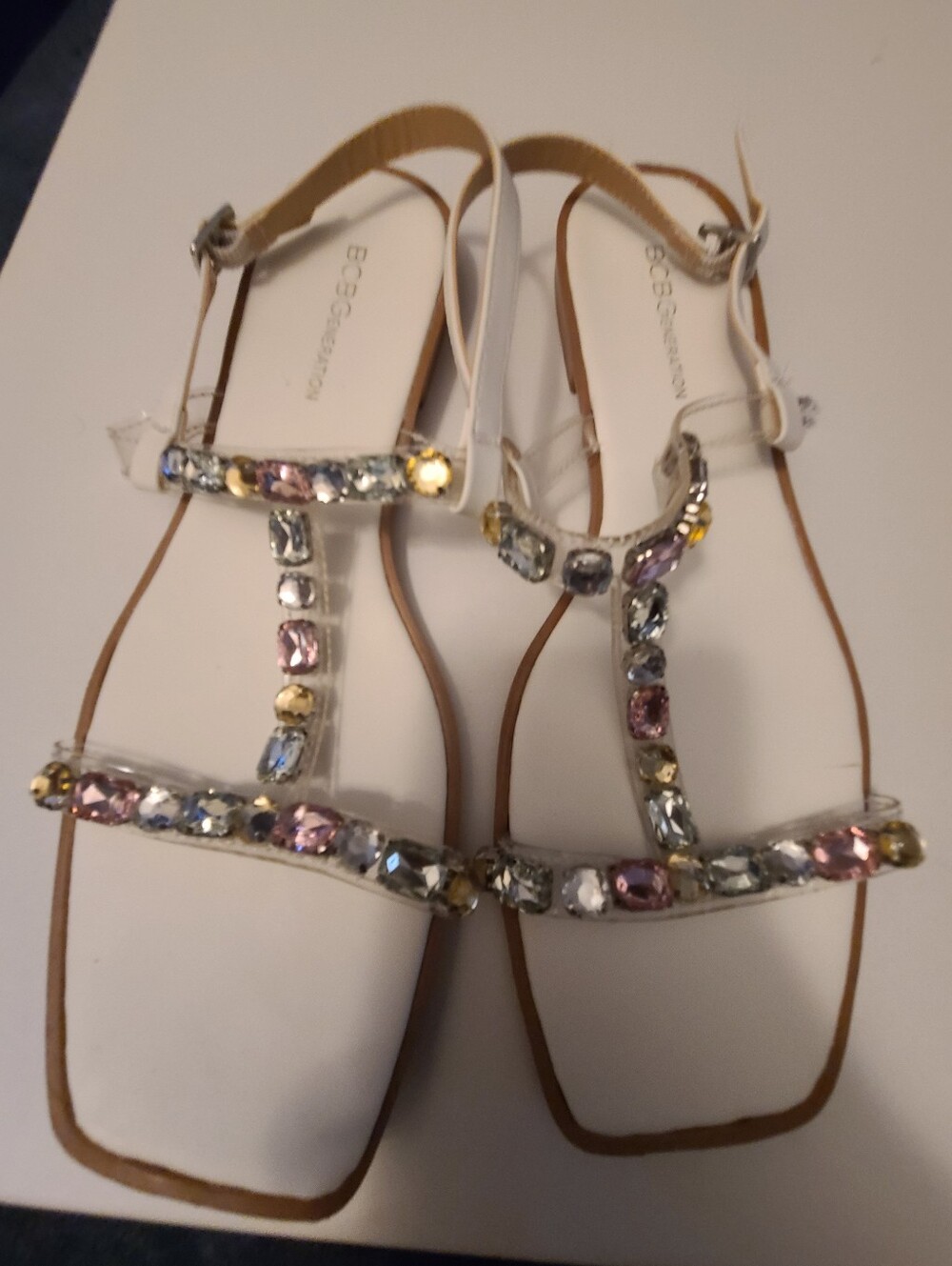 BCBGeneration White T-Strap Sandals with Multicolor Gem Accents